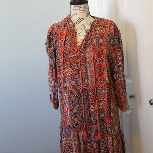 Fun, bohemian dress with long sleeves. Cotton Lining.